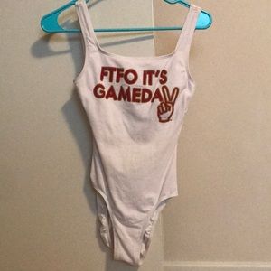 USC Gameday bodysuit brand is Danskin size S-P (4-6)